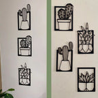 Kit 4 Quadros de cactos vazados em MDF preto premium. Design moderno, ecológico e fácil instalação com fita dupla face. Ideal para salas, varandas e cozinhas.