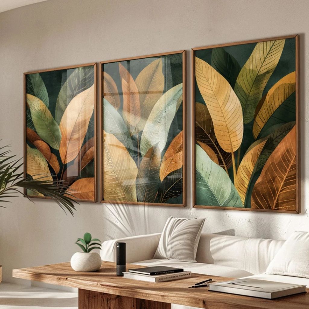 Tríptico Selva Feuillage com moldura caixinha e impressão premium. Folhas tropicais sofisticadas em tons dourados e verdes para salas e quartos elegantes.