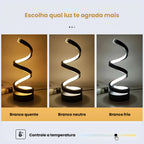 Luminária LED Rond com design espiral sofisticado. 3 tons de branco, ajuste de brilho e conexão USB. Perfeita para cabeceiras, escritórios e leitura. Compre agora.